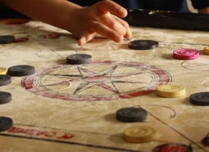 Exciting-World-of-Carrom_-Full-Size-Boards-Coins-Stands-and-Strikers